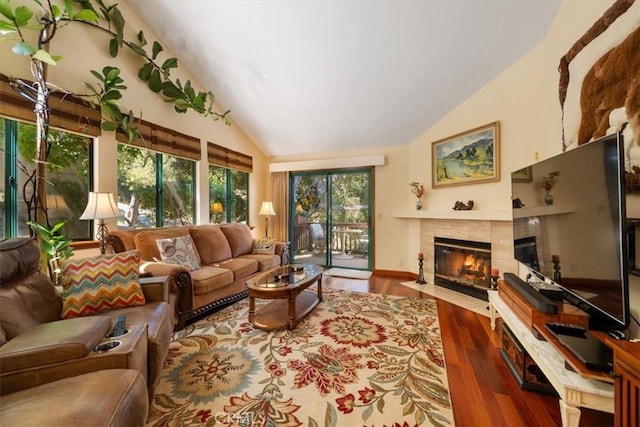6271 Twinberry Cir Unit 6, Avila Beach, CA 93424 - living area with vaulted ceiling, a fireplace, and wood finished floors