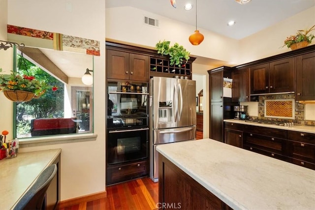 6271 Twinberry Cir Unit 6, Avila Beach, CA 93424 - kitchen with appliances with stainless steel finishes, dark brown cabinets, dark wood-style floors, light countertops, and recessed lighting