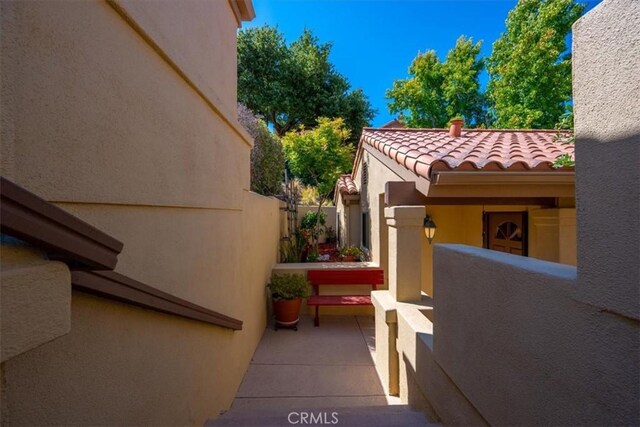 6271 Twinberry Cir Unit 6, Avila Beach, CA 93424 - view of property exterior with a tile roof and stucco siding