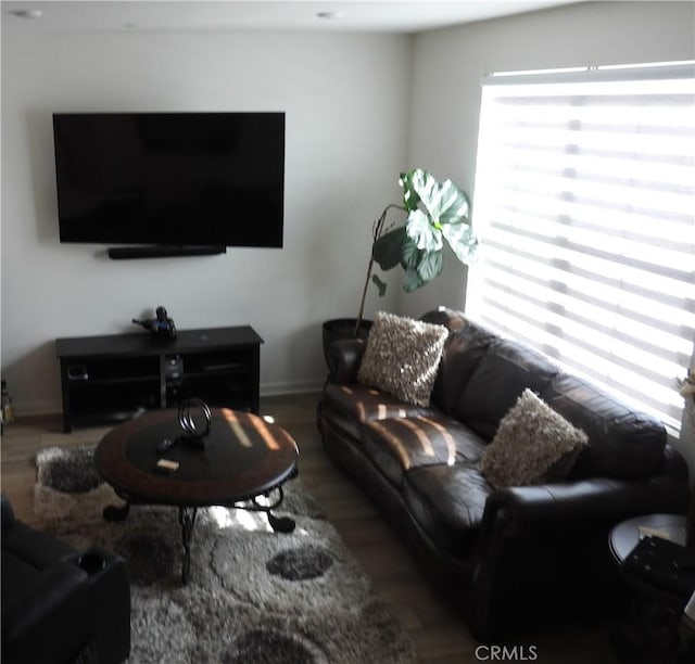 975 W Clover Ave, Rialto, CA 92376 - living area featuring wood finished floors