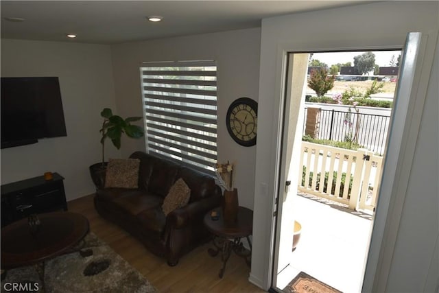 975 W Clover Ave, Rialto, CA 92376 - living area with wood finished floors and plenty of natural light
