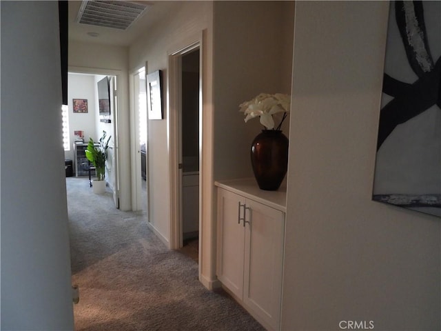 975 W Clover Ave, Rialto, CA 92376 - hallway featuring light carpet