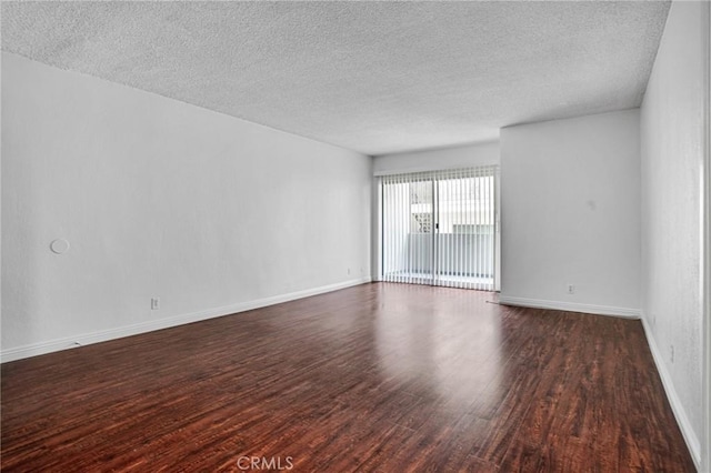 218 E Tamarack Ave Unit 5, Inglewood, CA 90301 - unfurnished room with wood finished floors and a textured ceiling