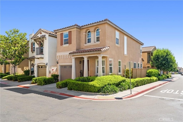 1474 De La Vina St, Chula Vista, CA 91913 - view of front facade with an attached garage, a tiled roof, and stucco siding