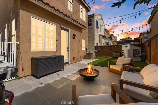 1474 De La Vina St, Chula Vista, CA 91913 - patio terrace at dusk with a fire pit and a patio area