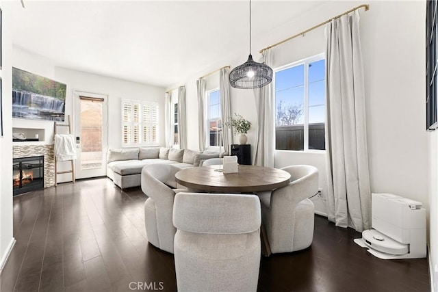 1474 De La Vina St, Chula Vista, CA 91913 - dining space featuring dark wood-style floors and a glass covered fireplace