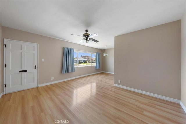 15511 Gramercy Pl, Gardena, CA 90249 - unfurnished living room with ceiling fan and light wood-style flooring
