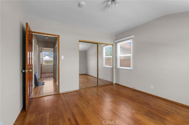 15511 Gramercy Pl, Gardena, CA 90249 - unfurnished bedroom featuring wood finished floors and a closet