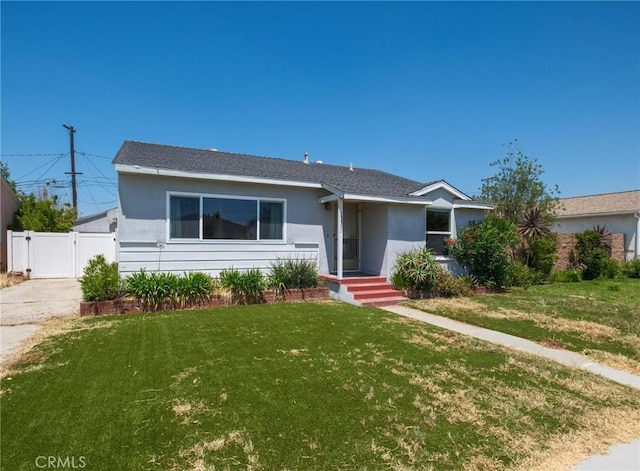 15511 Gramercy Pl, Gardena, CA 90249 - view of front of house featuring a gate and stucco siding