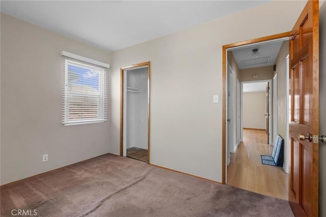 15511 Gramercy Pl, Gardena, CA 90249 - unfurnished bedroom featuring light colored carpet and a closet
