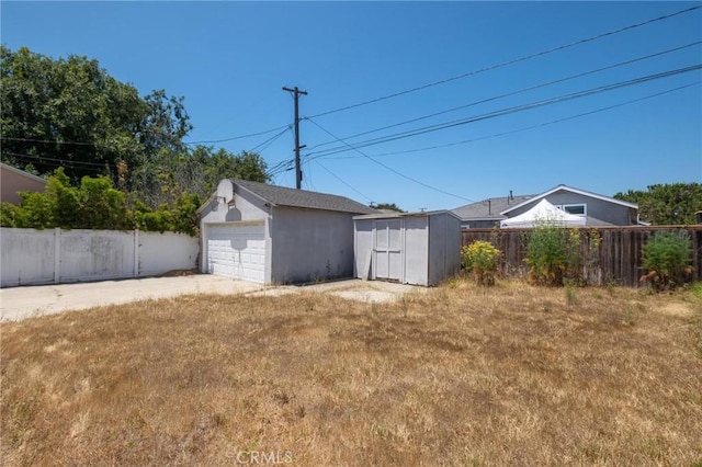 15511 Gramercy Pl, Gardena, CA 90249 - view of yard featuring a detached garage and a storage unit