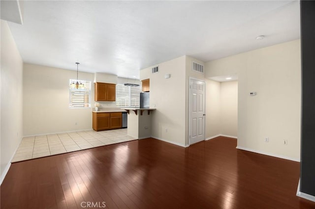 1565 Ledgestone Ln, Pomona, CA 91767 - unfurnished living room with light wood-style flooring