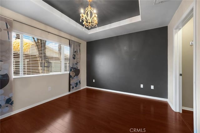 1565 Ledgestone Ln, Pomona, CA 91767 - unfurnished room featuring wood finished floors and a chandelier