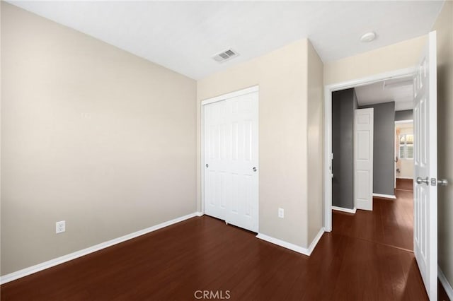 1565 Ledgestone Ln, Pomona, CA 91767 - unfurnished bedroom featuring wood finished floors and a closet