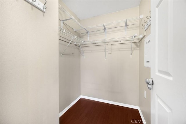 1565 Ledgestone Ln, Pomona, CA 91767 - walk in closet featuring wood finished floors