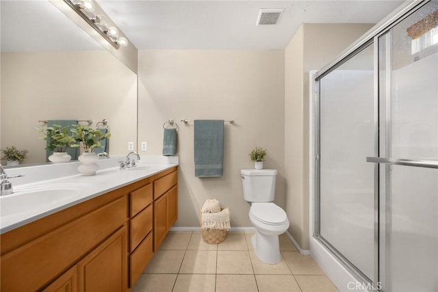 1565 Ledgestone Ln, Pomona, CA 91767 - full bath with double vanity, an enclosed shower, and tile patterned floors