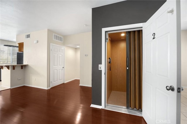 1565 Ledgestone Ln, Pomona, CA 91767 - corridor with baseboards and hardwood / wood-style flooring