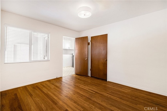 1245 Palm Ave, Chico, CA 95926 - spare room with wood finished floors and baseboards