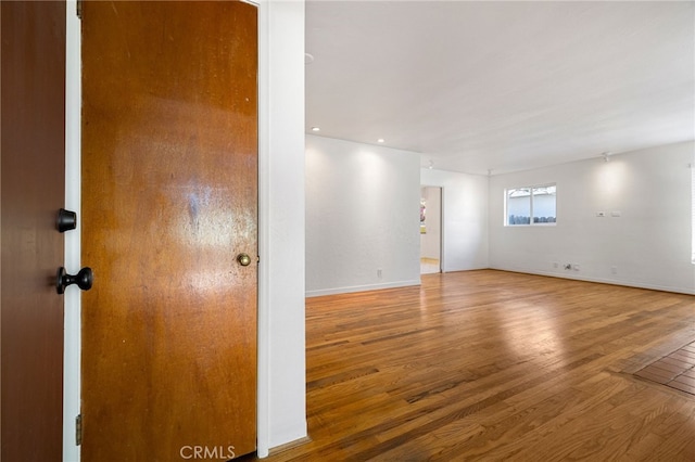 1245 Palm Ave, Chico, CA 95926 - spare room featuring wood finished floors and baseboards