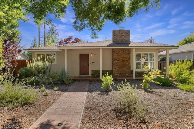 1245 Palm Ave, Chico, CA 95926 - single story home with a chimney and stucco siding