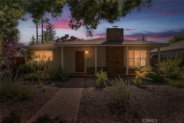 1245 Palm Ave, Chico, CA 95926 - ranch-style home with a chimney and stucco siding