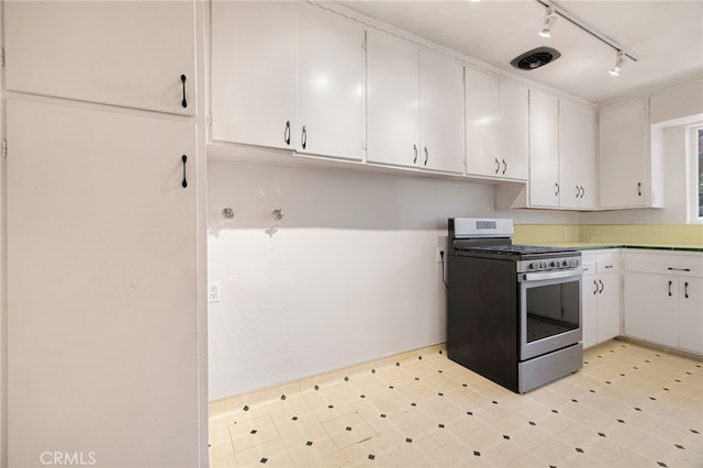 1245 Palm Ave, Chico, CA 95926 - kitchen featuring gas stove, white cabinetry, light flooring, track lighting, and light countertops