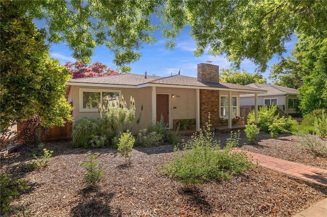 1245 Palm Ave, Chico, CA 95926 - ranch-style home with a chimney and stucco siding