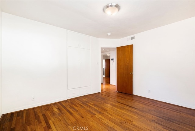 1245 Palm Ave, Chico, CA 95926 - unfurnished room with wood finished floors and baseboards