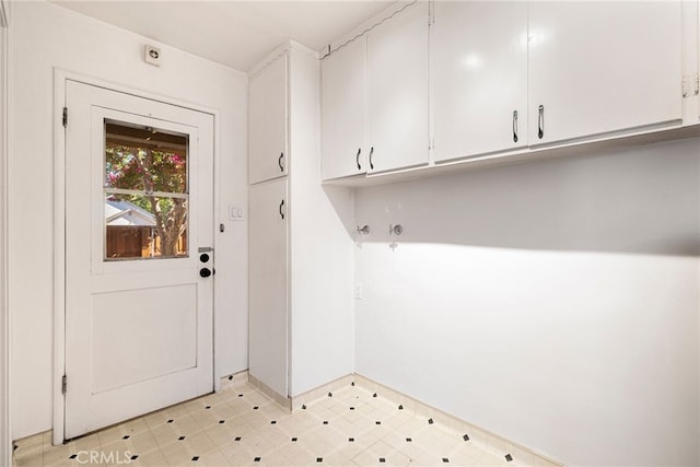 1245 Palm Ave, Chico, CA 95926 - laundry room featuring cabinet space and baseboards