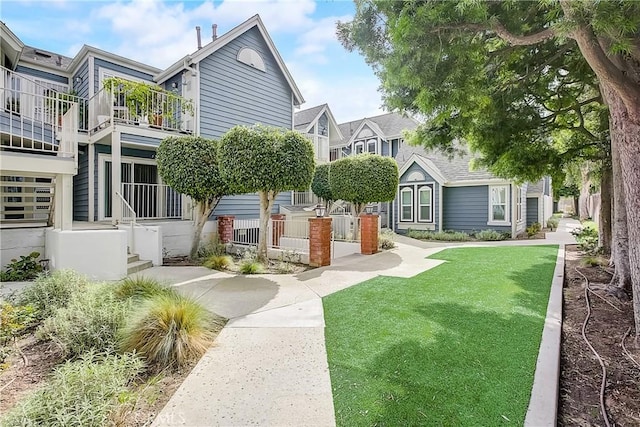 810 Baker St Unit 210, Costa Mesa, CA 92626 - view of community featuring a lawn