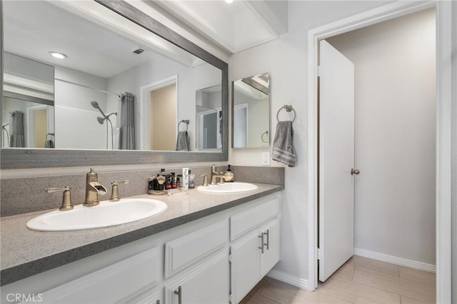 810 Baker St Unit 210, Costa Mesa, CA 92626 - bathroom featuring double vanity and a shower with shower curtain