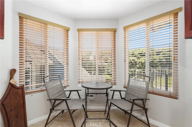 810 Baker St Unit 210, Costa Mesa, CA 92626 - dining area featuring baseboards