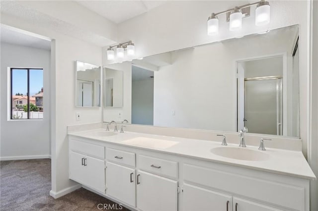 1122 W Galway St, Rialto, CA 92377 - bathroom featuring double vanity and an enclosed shower