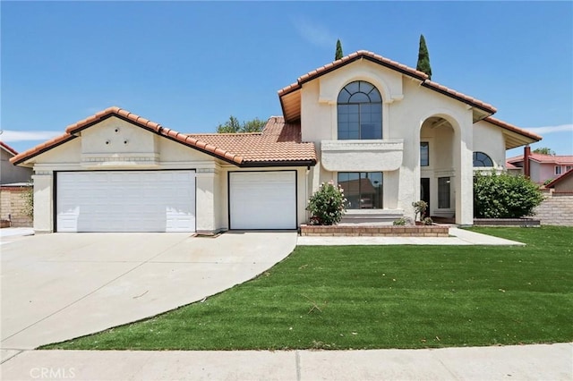 1122 W Galway St, Rialto, CA 92377 - mediterranean / spanish home with a tiled roof, an attached garage, stucco siding, driveway, and a front yard