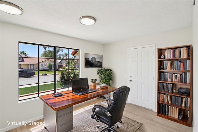 1122 W Galway St, Rialto, CA 92377 - office with light wood finished floors and baseboards