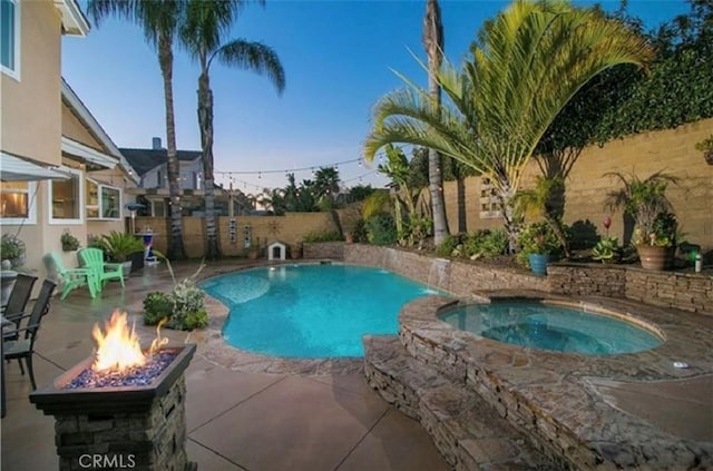25491 2nd St, Lake Forest, CA 92630 - view of pool featuring an outdoor fire pit, an in-ground hot tub, a patio area, and a fenced backyard