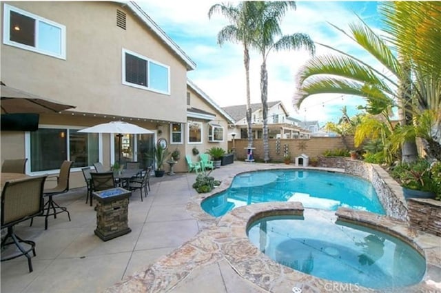 25491 2nd St, Lake Forest, CA 92630 - view of swimming pool with a fenced backyard, a pool with connected hot tub, and a patio area
