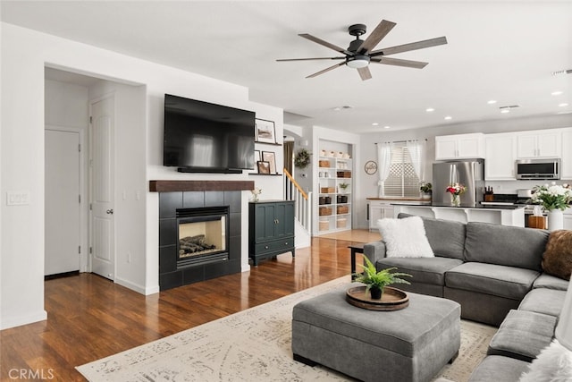 3192 Sawyers Bar Ln, Chico, CA 95973 - living area with ceiling fan, stairway, wood finished floors, recessed lighting, and a fireplace