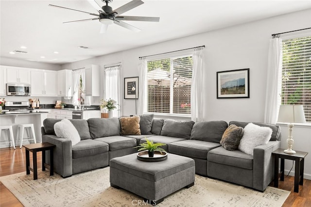 3192 Sawyers Bar Ln, Chico, CA 95973 - living room featuring light wood-style floors, ceiling fan, and recessed lighting