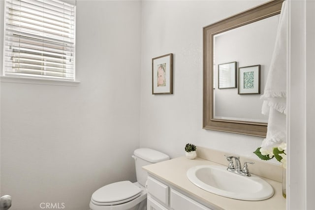 3192 Sawyers Bar Ln, Chico, CA 95973 - half bathroom featuring vanity and toilet