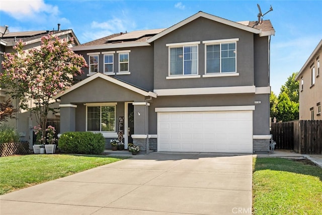3192 Sawyers Bar Ln, Chico, CA 95973 - traditional-style house featuring stone siding, stucco siding, solar panels, and a garage