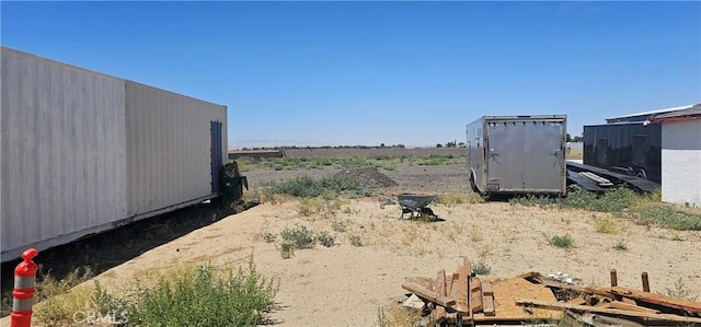 45219 12th St, Lancaster, CA 93535 - view of yard with an outdoor structure