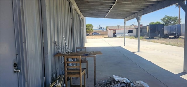 45219 12th St, Lancaster, CA 93535 - view of patio / terrace with a carport and driveway