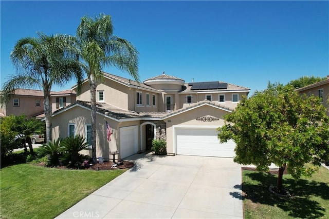 31956 Via Del Paso, Winchester, CA 92596 - mediterranean / spanish home with stucco siding, solar panels, a tiled roof, and a front lawn