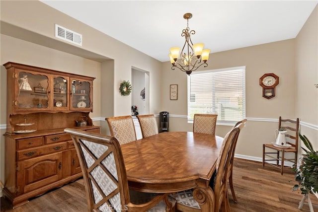 31956 Via Del Paso, Winchester, CA 92596 - dining room with dark wood-style flooring and a chandelier