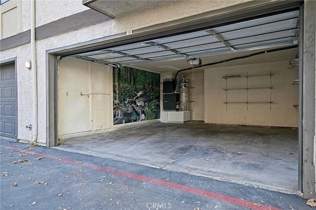 1209 Edwards St Unit 56, Redlands, CA 92374 - garage with a garage door opener, water heater, and heating unit