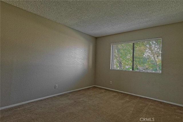 1209 Edwards St Unit 56, Redlands, CA 92374 - carpeted spare room featuring baseboards and a textured ceiling