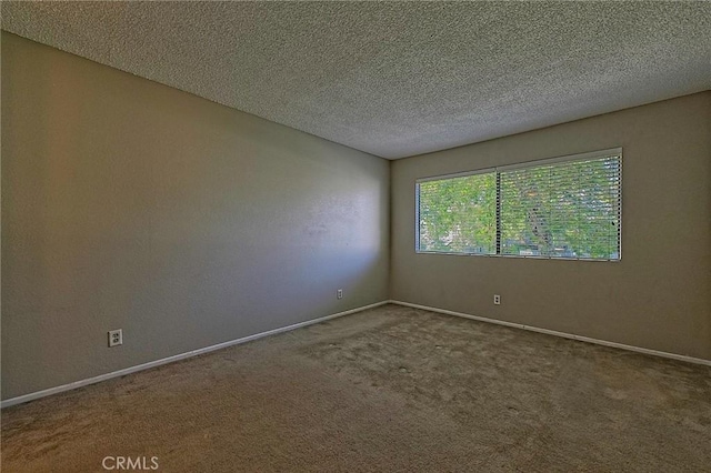1209 Edwards St Unit 56, Redlands, CA 92374 - empty room featuring carpet and a textured ceiling