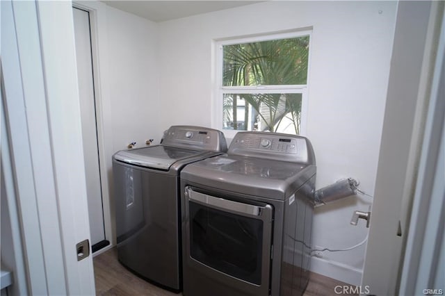 1020 Lantana Dr, Los Angeles, CA 90042 - laundry area with washing machine and clothes dryer and wood finished floors