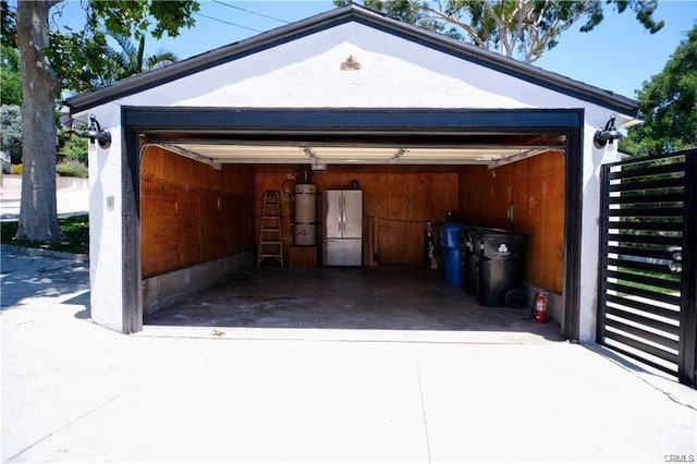 1020 Lantana Dr, Los Angeles, CA 90042 - detached garage featuring freestanding refrigerator and a central vacuum unit